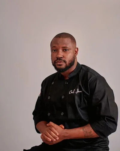 Restaurant General Manager and Maître d' in tailored hospitality attire